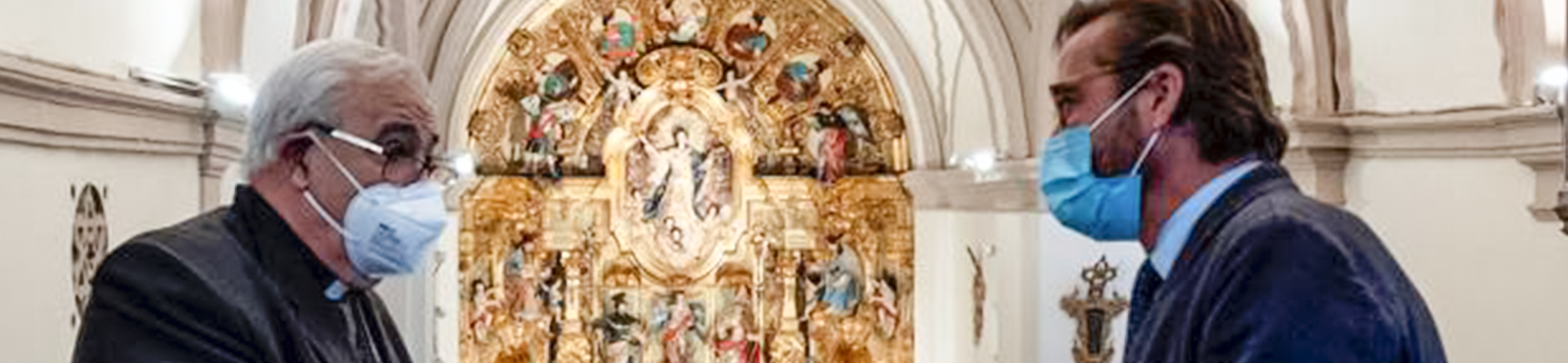 Presentación en público del retablo restaurado de la Abadía